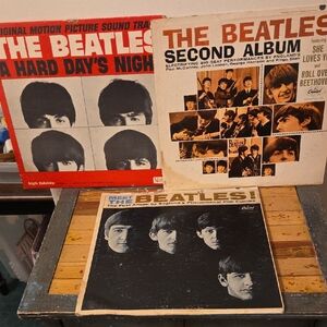 The Beatles Album Trio with Red, Black, and White Covers